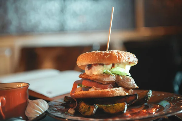 Big burger with chicken and feta cheese