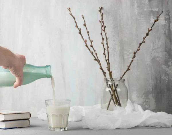 Hand Pouring Fresh Milk Glass — Stock Photo, Image