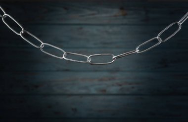 Mavi ahşap arka plan üzerinde eski Demir zinciri