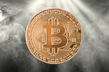 Bitcoin on a smoky background clipart