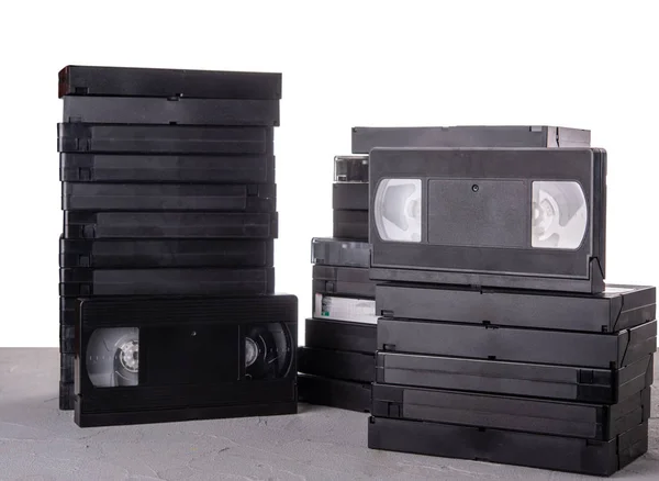 Muchos Casetes Vídeo Vhs Escritorio Con Fondo Aislado —  Fotos de Stock