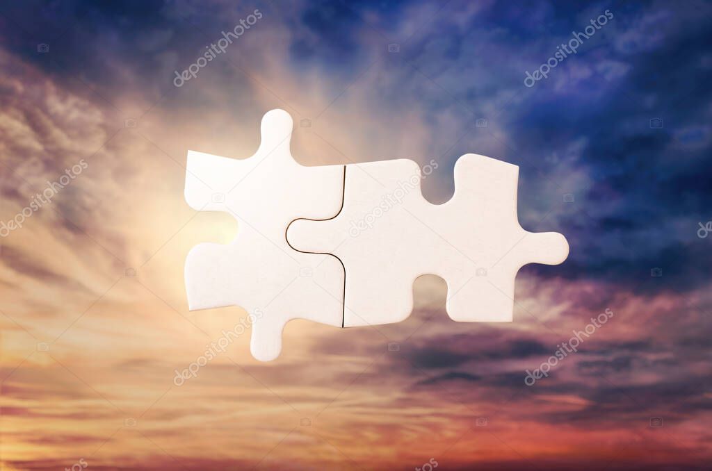 Empty puzzle against a dramatic sky