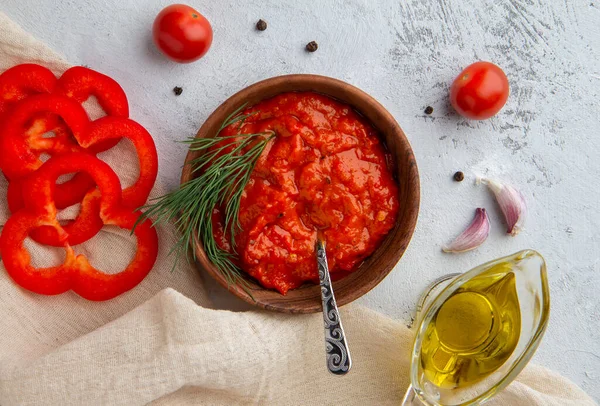 Ajvar vegetable pepper caviar in a bowl on a light background — Stock Photo, Image