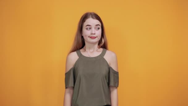 Portrait of woman with closed eyes and covering nose with hand, like crying — Stock Video