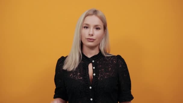 Girl in black dress smiling woman shows her palms what the stop sign means — Stock Video