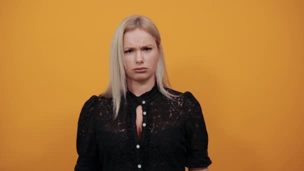 Girl in black dress angry woman shows protest turned her thumb down — Stock Video