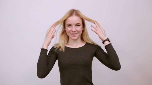 Happy Girl Smiling Shows Forefinger Forward. Concept Of Good, Successful People — Stock Video