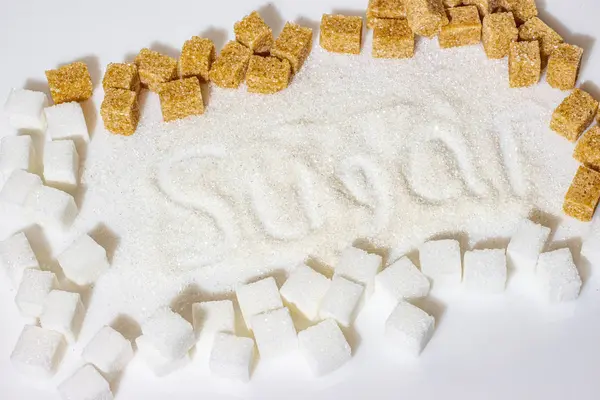 Çerçeve kahverengi ve beyaz şekerden yapılmıştır, şekerin ortasında yazılıdır..