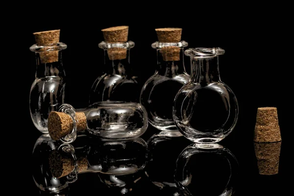 Glass Empty Flasks Corks Black Background Isolate Black — Stock Photo, Image