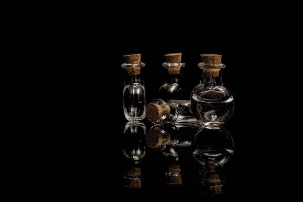 Glass Empty Flasks Corks Black Background Isolate Black — Stock Photo, Image