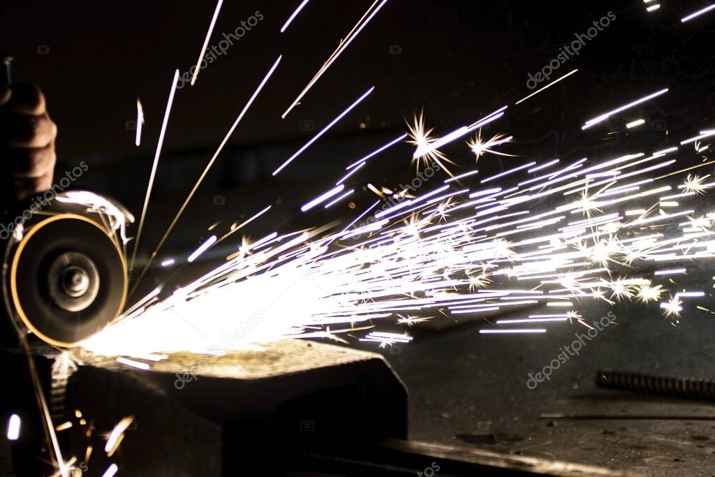 Metal processing using an abrasive wheel.