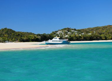 Boat In The Turquoise Water Of The Tropical Bay Of Great Keppel Island Queensland Australia