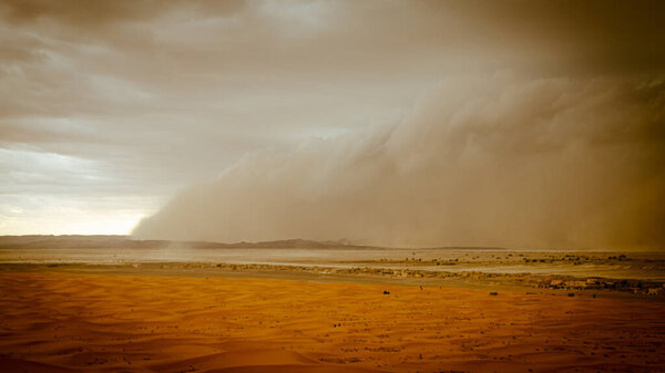 Sandstorm Approaching Merzouga Settlement,in Erg Chebbi Desert Morocco,Africa 