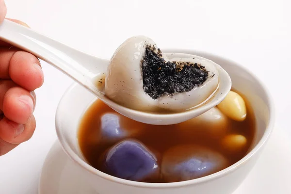 Tang Yuan(sweet dumplings) filled with black sesame. — Stock Photo, Image