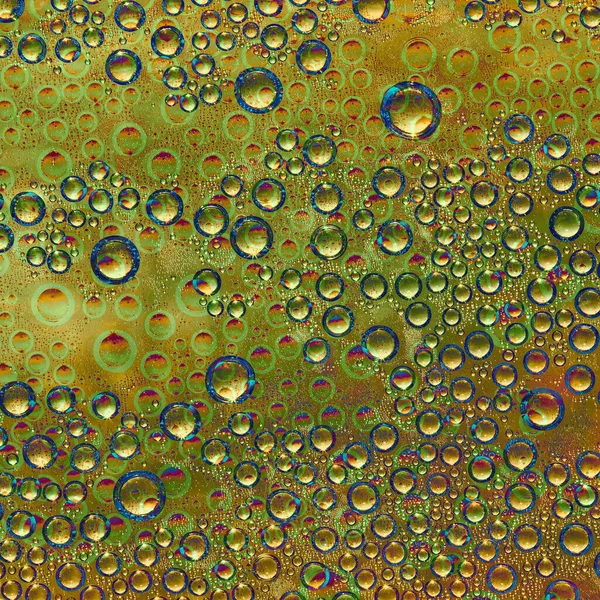 Esferas Diferentes Diâmetros Cores Laranja Amarela Dourada Seus Reflexos Verdes — Fotografia de Stock