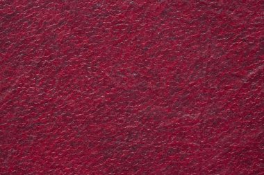 Doku. Siyah desenli kırmızı deri bir iç döşeme parçası. Yakın plan..