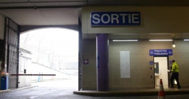 Exit sign and public toilets in Paris bus station, France, 5.2.2020