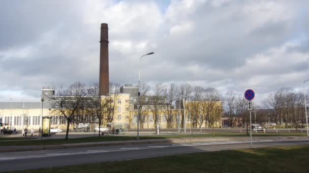 Cars and energy tower of Tallinn, Estonia, 4.2.3030 — Stock Video