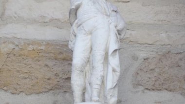 Cinematic view of Marble white traditional ancient french statue in front of Mansle,  France, 6.3.2020