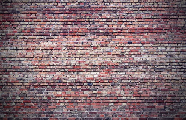 A parede é feita de tijolos. A textura da parede . — Fotografia de Stock