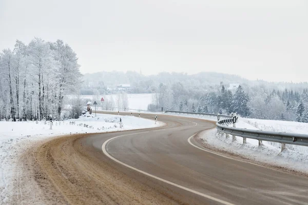 S-shape rural road through a winter wonderland — Stock Photo, Image