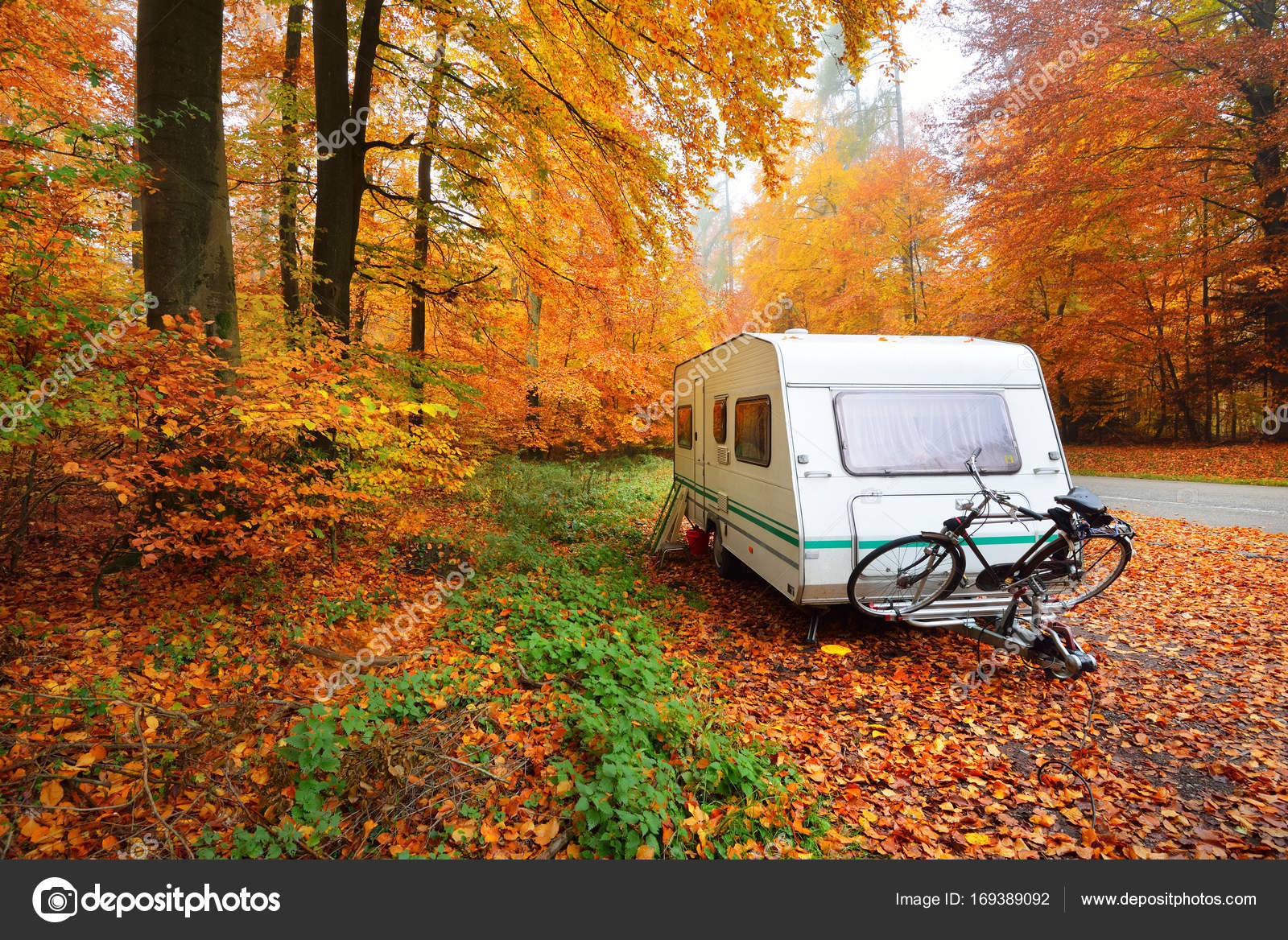 Caravan Trailer With Bicycle Parked In Forest Stock Photo Image By C Alex Stemmer Caravan Trailer With Bicycle Parked In Forest Stock Photo Image By C Alex Stemmer