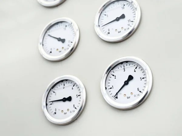 A set of shiny industrial barometers — Stock Photo, Image