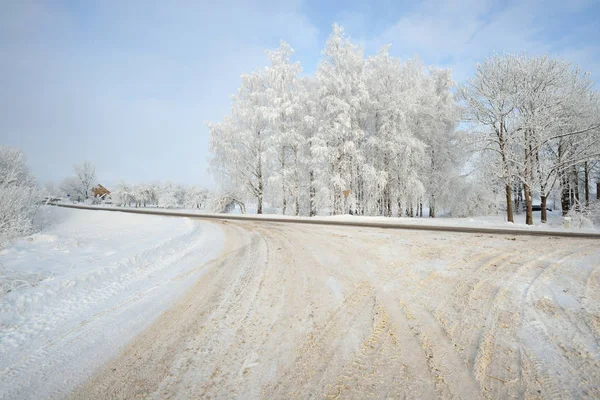 Skladby na zasněženou polní cestu — Stock fotografie