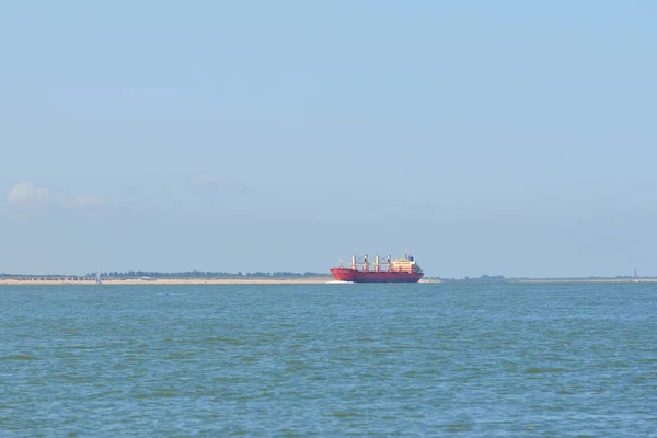 Cargo ship sailing in sea — Stock Photo, Image