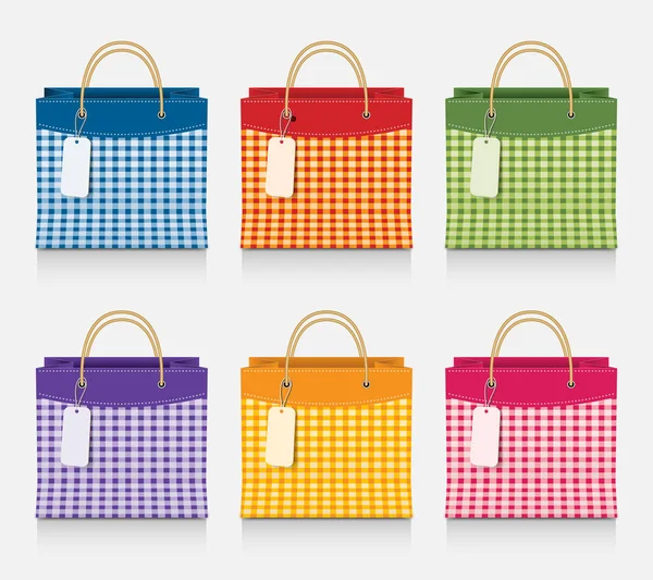 Ensemble vectoriel de sacs à provisions colorés — Image vectorielle