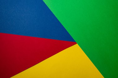 Dört renkten yapılmış renkli bir arka plan. Çok renkli bir duvar kağıdının üst görüntüsü. Metin için boşluk