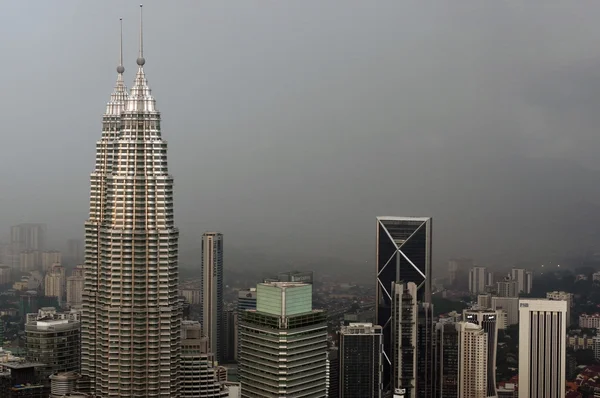 Kuala Lumpur, Malaysia - November 17. 2016: Dramatic scenery of the KualaLumpur city at sunset. View from the KL-Tower Menara  . Royalty Free Stock Images