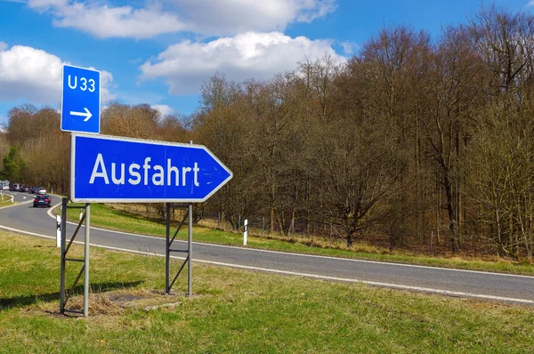ドイツの道路標識: ジャンクション、翻訳の道標: 終了 ロイヤリティフリーのストック画像