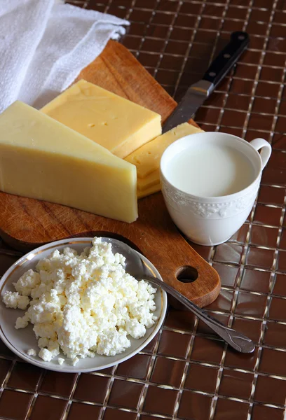 A cup of milk, cheese and curd. — Stock Photo, Image