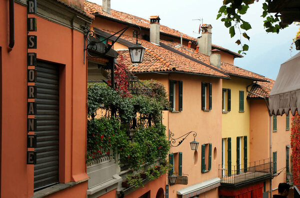 November 4, 2017, Bellagio, Italy, View of colorful, colorful houses with lanterns and flowers on the balconies.