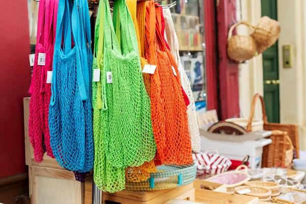 String bags. Store with many different colors string bags, basket. No plastic, zero waste concept store. Recyclable reuse shopping bags in eco friendly environmental protection Shop.