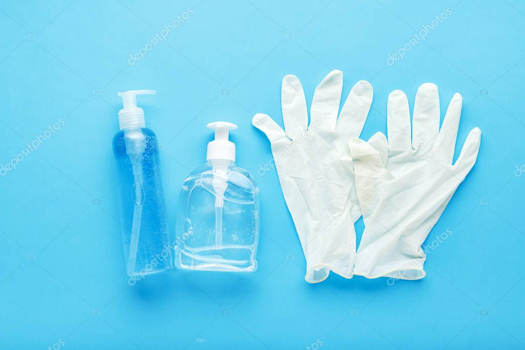 Hand hygiene, rubber gloves, different bottles of hand sanitizers, antiseptic gel. Virus protection, antibacterial gel, soap.Concept medicine health care. Coronavirus Covid-19 Sars-cov-2 Prevention.