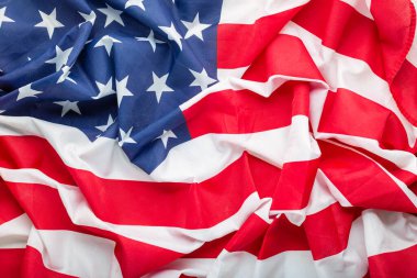 ABD bayrağı geçmişi. Demokrasi, vatanseverlik, ABD Anma Günü ya da 4 Temmuz 'un sembolü olarak Amerikan ulusal bayrağı. Amerika Birleşik Devletleri ya da ABD bayrağının yakın çekim dokusu.