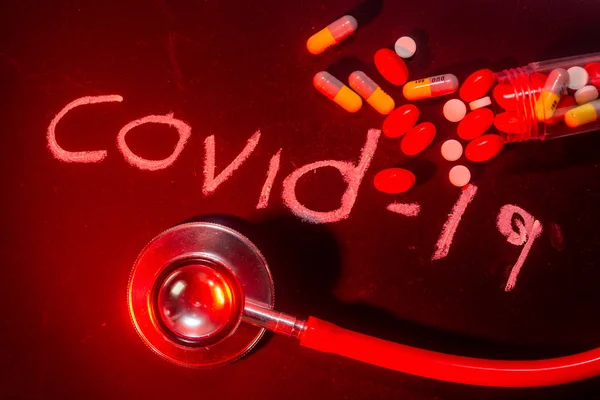 Covid-19 Coronavirus Concept  -  writing on black board with cre — Stock Photo, Image