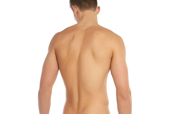 Σπορ και το γυμναστήριο θέμα: γυμνός άνδρας σπορ στέκεται πίσω απομονωθεί σε λευκό φόντο στο στούντιο, ανθρώπινη ανατομία — Φωτογραφία Αρχείου