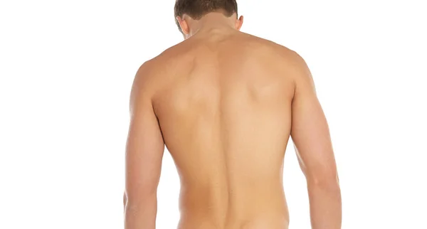 Tópico de esportes e fitness: homem esportivo nu em pé isolado em um fundo branco no estúdio, anatomia humana — Fotografia de Stock