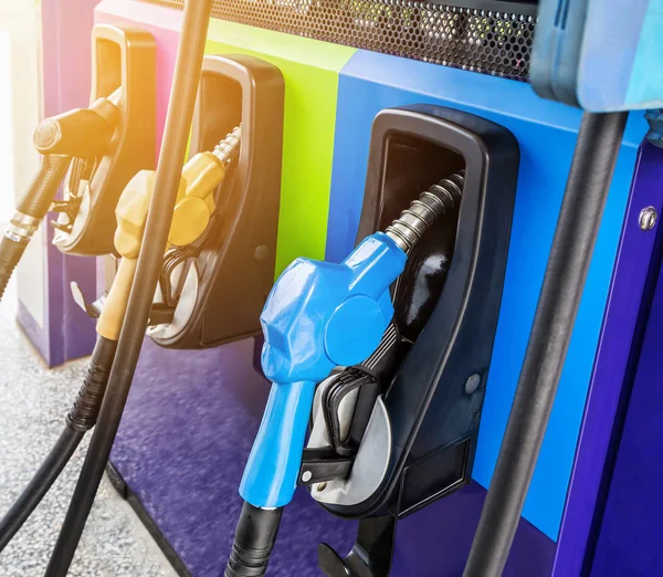Fuel nozzle refueling gas pump in service station — Stock Photo, Image