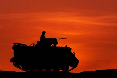silhouette armored personnel carrier vehicle military on sunset   clipart