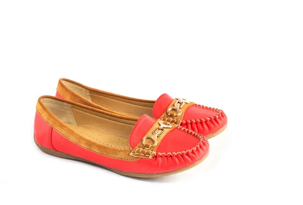 Красные и коричневые замшевые женские кожаные туфли — стоковое фото
