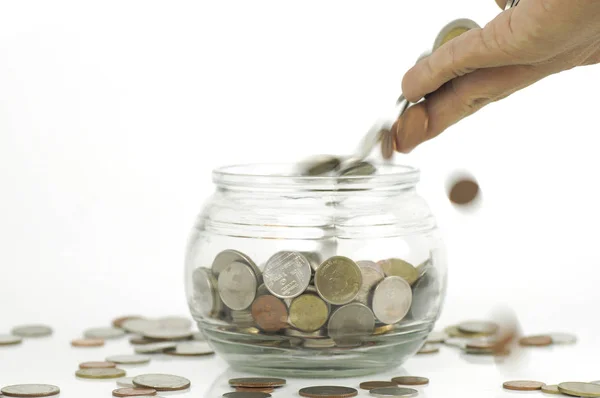 Hand put money on jar of banking to save — Stock Photo, Image