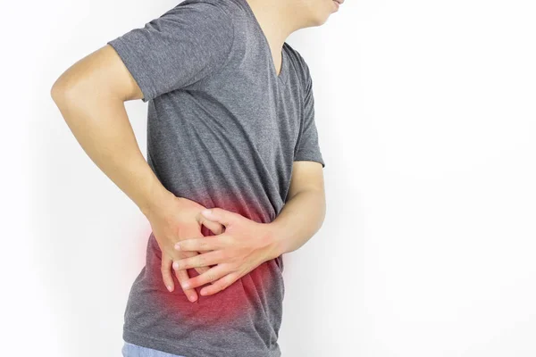 Hombre Chico Tiene Dolor Cintura Ropa Gris Sobre Fondo Blanco — Foto de Stock