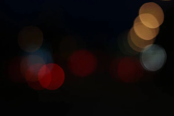 Bokeh luz na rua e fundo abstrato — Fotografia de Stock