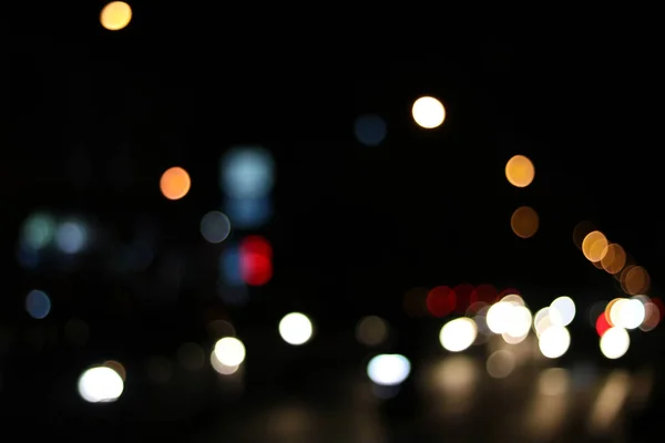 Bokeh lumière sur la rue et fond abstrait — Photo
