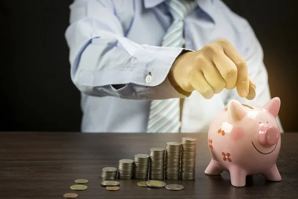 Businessman Put Money Coins Piggy Bank Wood Table Concept Investment — Stock Photo, Image