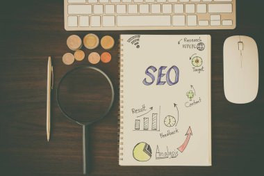 Seo ve grafik kağıdına Büyüteç, para sikke üzerinde çalışma tablosu Üstten Görünüm